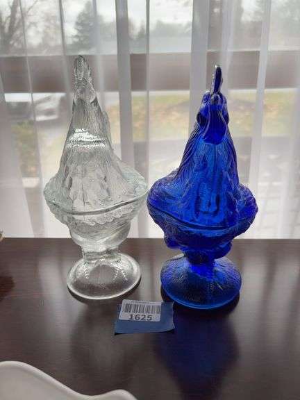 Two glass figural rooster covered dishes: clear and cobalt blue