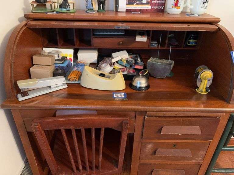 Office supply contents in desk - bring screwdriver to remove pencil sharpener - no top contents