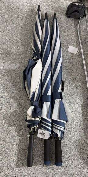 Three Golf Umbrellas