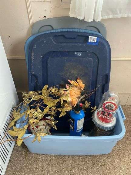 Tote w/ metal wall sculpture, propane torch, Coke clock, misc