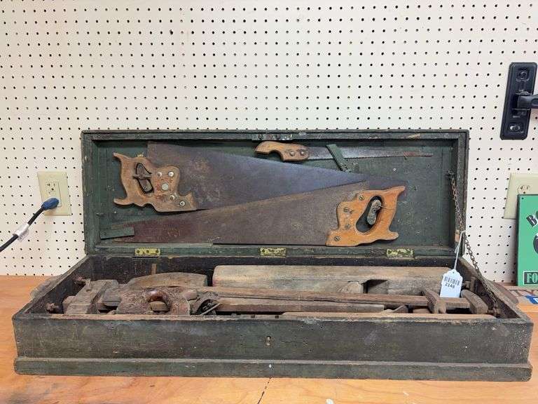 Handsaws w/ antique wooden chest & various saw parts