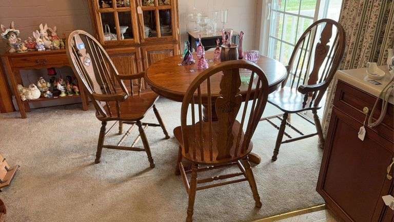 Round oak pedestal table w/ two leaves, and set of three Windsor arm chairs 42x42x30