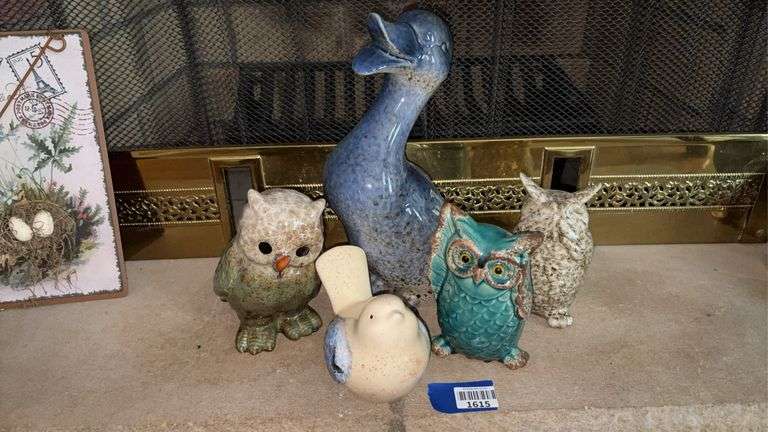 Ceramic owls, duck and bird figures