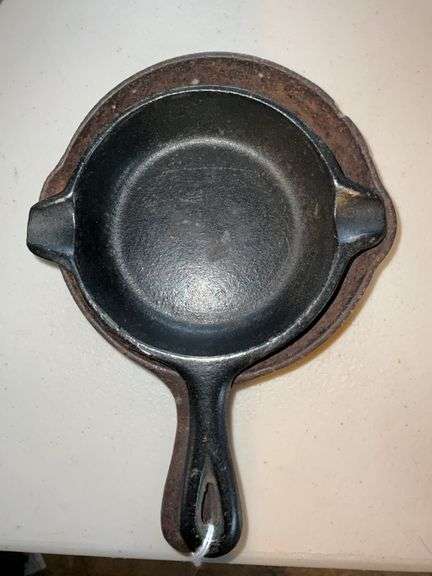 Two small cast iron skillets including WagnerWare 1950