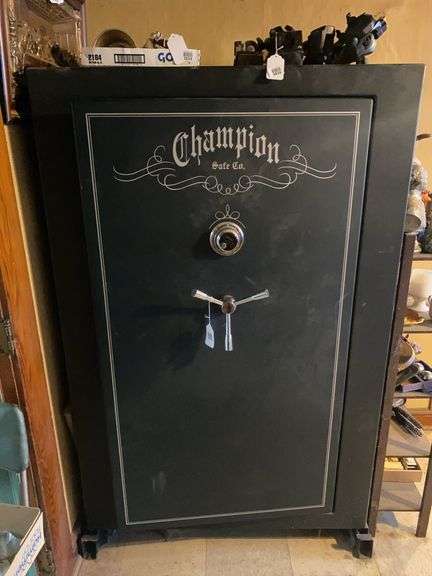 Champion gun safe w/ 52 gun slots 40x26x64 - combination will be provided