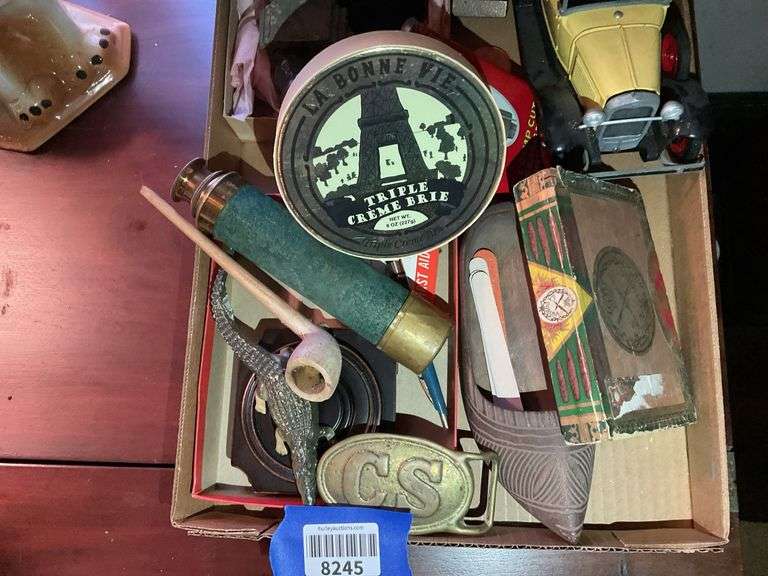 Collectibles discovery lot including: tin house model, CS belt buckle ...