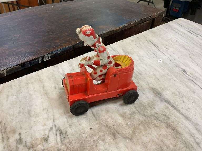 Vintage plastic car with clown