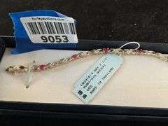 Gold over silver ruby and diamond accent bracelet
