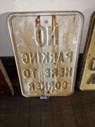 NO PARKING sign