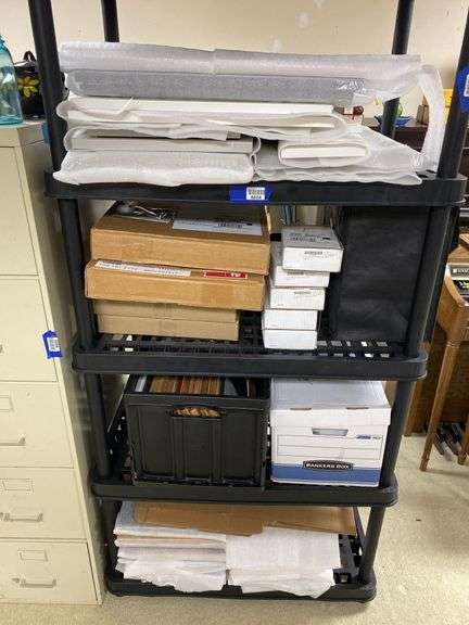 Contents of shelf unit: cabinet door front samples