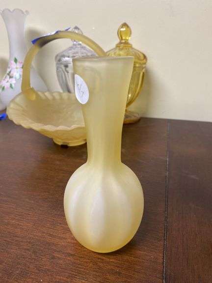 Two yellow satin glass bud vases