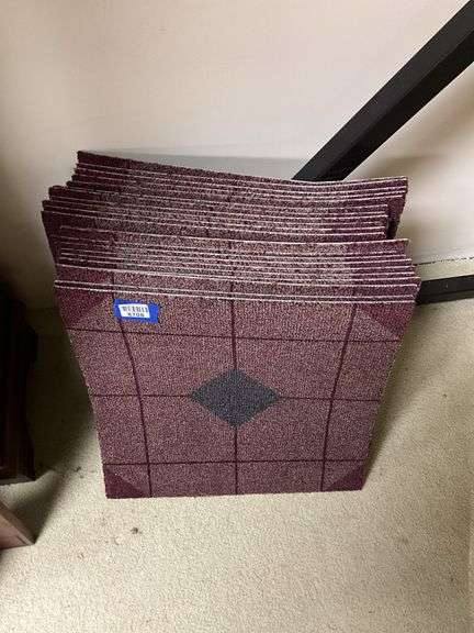 Stack of square carpet tiles