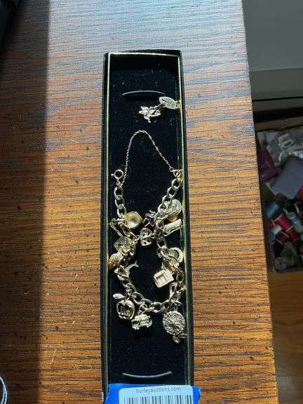 Charm Bracelet some 10kt & 14kt Gold Charms, inspection suggested