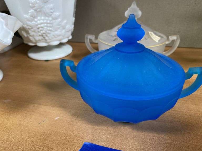 Two Westmoreland glass covered dishes: blue satin, and clear satin w/ handpainted decor