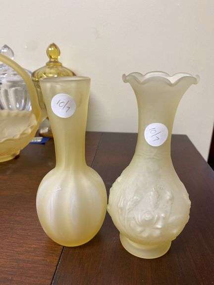 Two yellow satin glass bud vases