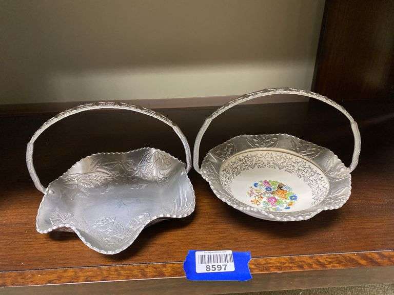 Two hammered aluminum baskets, one has china dish center