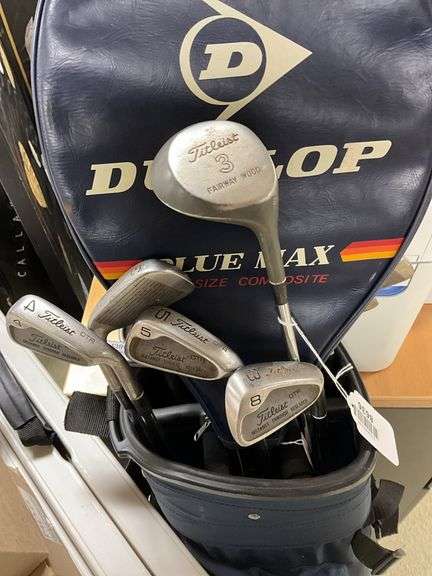 Titleist golf clubs in bag