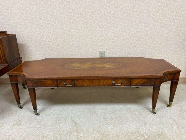 Mahogany coffee table w/ inset tooled leather top panel, comes w/ protective glass top 60x22x15.5