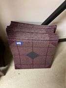 Stack of square carpet tiles