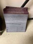 Stack of square carpet tiles