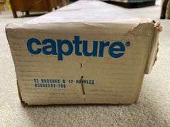 Twelve Capture brushes and handles in box
