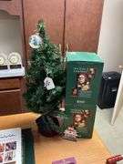 Two Howard Miller limited edition Santa figures in boxes, Baldwin brass Christmas ornaments, faux tree