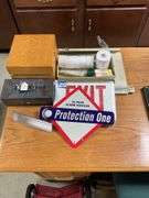 EXIT sign, cash box, wooden file box, misc
