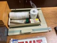 EXIT sign, cash box, wooden file box, misc