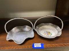 Two hammered aluminum baskets, one has china dish center