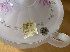 Two Westmoreland glass covered dishes: blue satin, and clear satin w/ handpainted decor