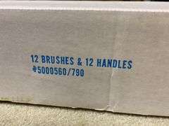 Twelve Capture brushes and handles in box