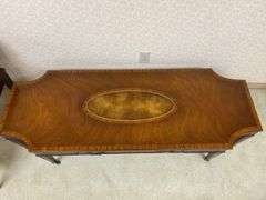 Mahogany coffee table w/ inset tooled leather top panel, comes w/ protective glass top 60x22x15.5