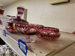 Nachtmann ruby stained crystal footed bowl and two ashtrays