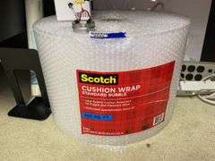 Roll of bubble wrap, power strips, misc