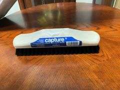 Capture twelve brushes and handles in box