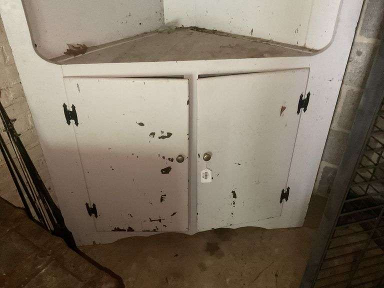 White corner cupboard w/ open top shelving, cupboard base