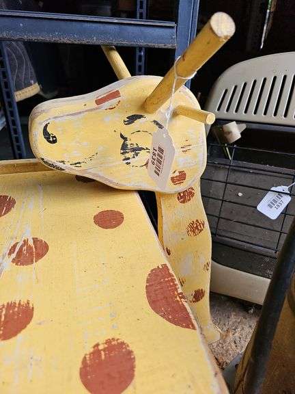 Painted giraffe shelf unit