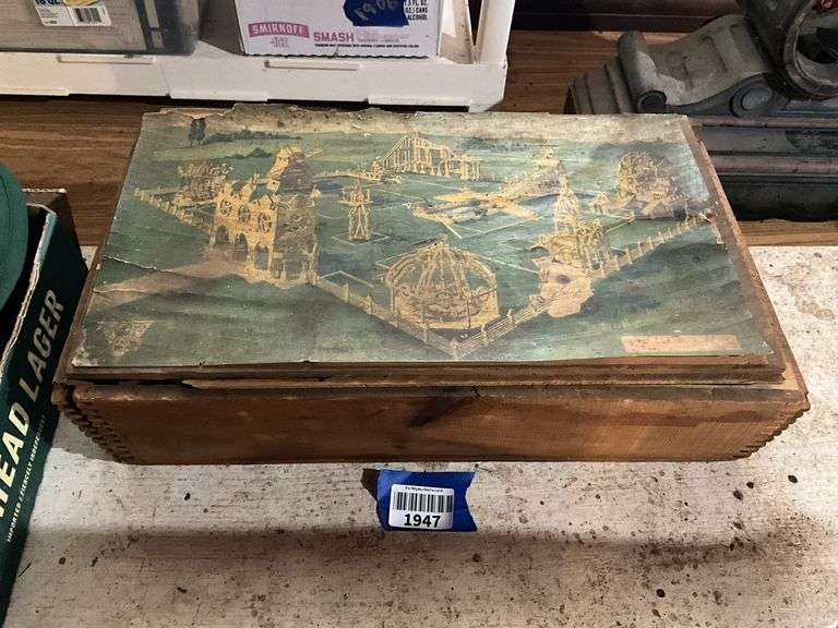 Antique toy wooden building set in wooden box w/ paper print on top of lid