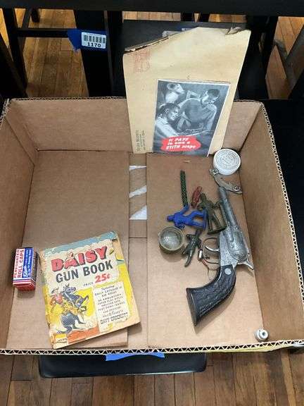 Vintage Marksman air pistol in box, Daisy toy gun catalog, cap pistol, caps box, license plates, PA State Forest Boundary marker