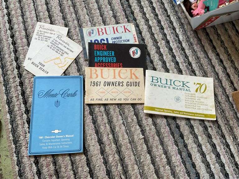 Vintage car manual collection and auto literature