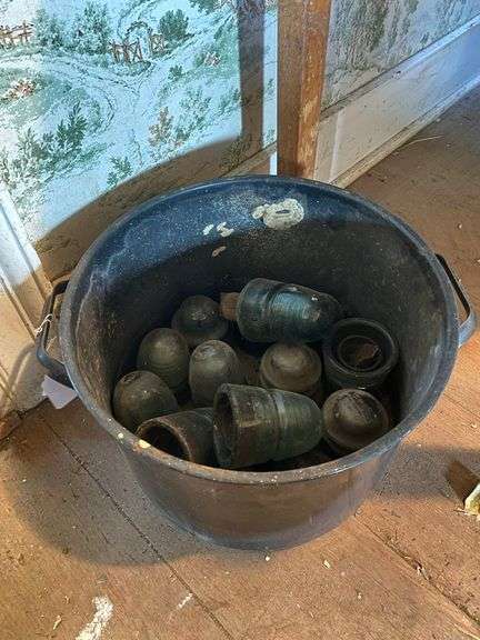 Glass insulators in speckled enamel kettle