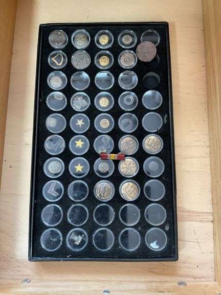 Military buttons and insignia