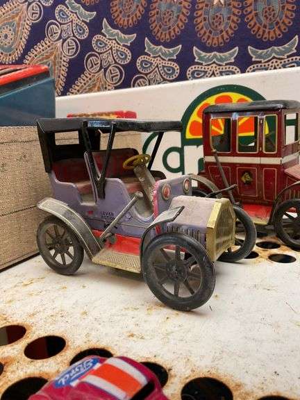 Two vintage litho tin lever action autos, and HotWheels Neet Streeter