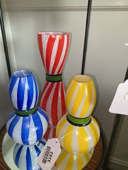 Three Kosta Boda Ribbon art glass vases and round mirror