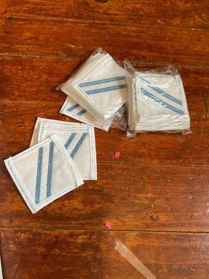 Patches including: Navy Seaman Apprentice, advertising, school letters