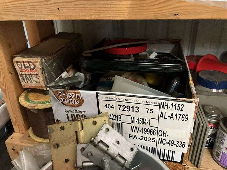 Contents of two shelves: hardware, misc