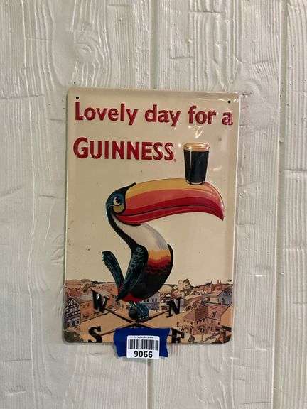 Guinness embossed tin advertising sign