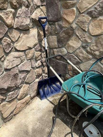 Wheelbarrow, garden hose, planter box, snow shovel