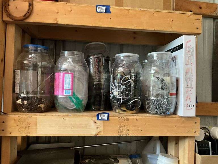Contents of shelf: jars of hardware, ball ties, misc