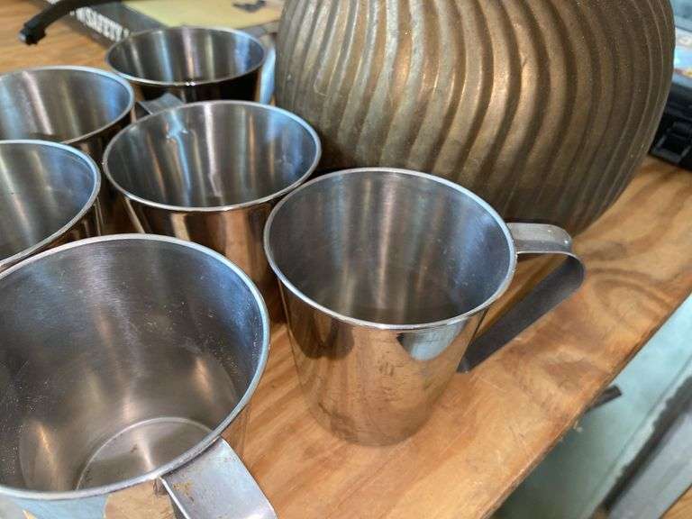 Copper jug, handled brass vase, metal cups set